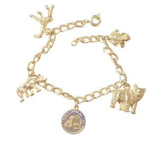 Vintage North Carolina Zoo Gold Tone Animal Charm Bracelet Giraffe Elephant Bear